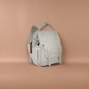This white backpack is simple, versatile, lightweight and has a large capacity for student commuting and travel Application Scenario
